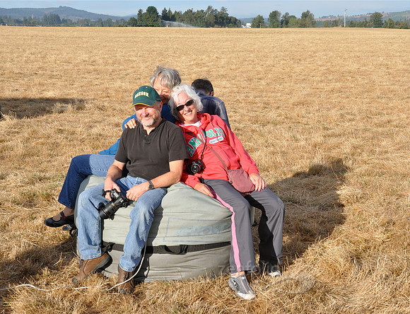 Sitting on the Balloon Bag to get the Air Out