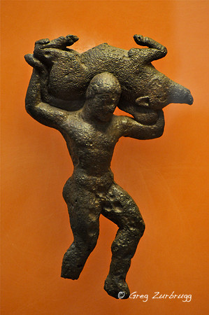 Herakles carrying the Erymanthian Boar on his shoulder as part of his Fourth Labor.