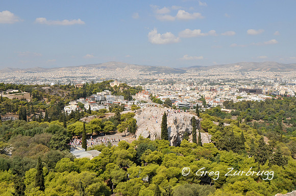 The Areopagus (Mars Hill) in the foreground.  On this hill, the Apostle Paul preached a sermon  recorded in the Bible (Acts 17:22-31).